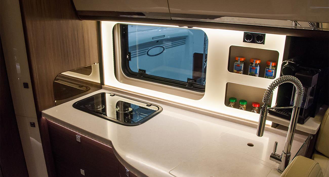 Interior of luxury caravan. Detail photo of coach with luxury equipment